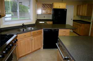 Large Kitchen with Maui Corian Countertops and Island 