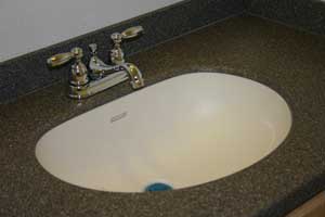 Bathroom sink in Maui Corian Countertop