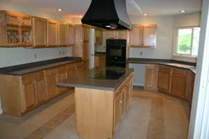 Large Kitchen with Maui Corian Countertops