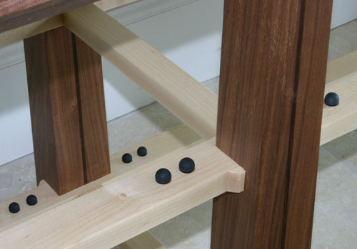 American Black Walnut stereo furniture - very close up of vibration absorbing balls